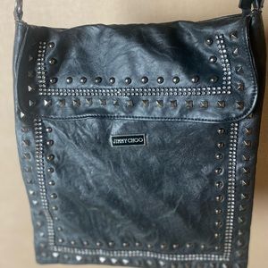 Jimmy Choo black purse with rhinestones. 2 inside zipper pockets. Real leather